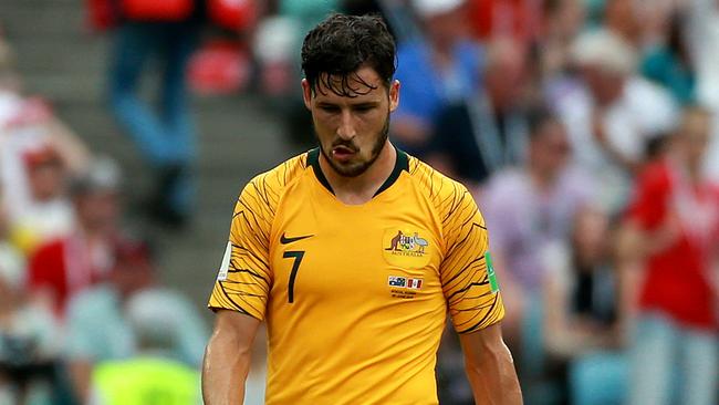 Soccerooâ€™s Mathew Leckie (front) and Josh Risdon after Peru score the opening goal in the Socceroos v Peru match at Fisht Stadium in Sochi during the 2018 World Cup in Russia. Picture: Toby Zerna