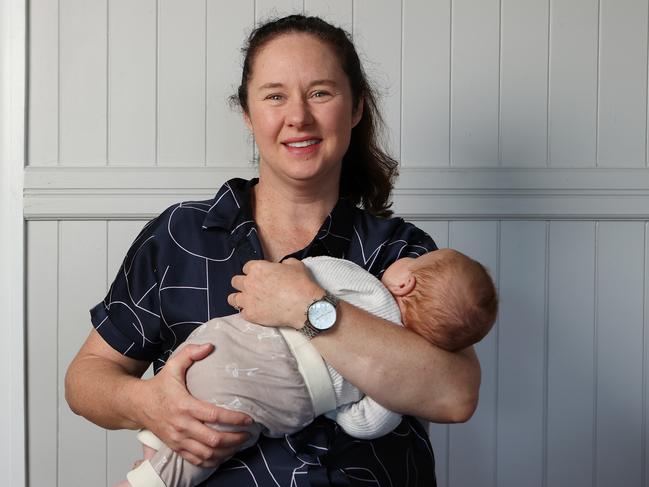 Mel Buttle with her new baby boy at home. Picture: Liam Kidston