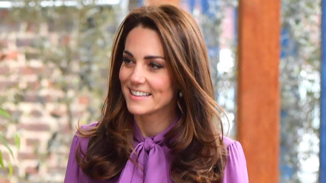 Kate Middleton appears to wear her £790 Gucci blouse back to front