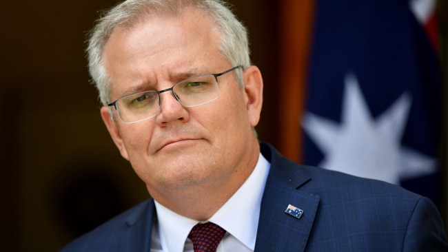 CANBERRA, AUSTRALIA - NOVEMBER 13:  Prime Minister Scott Morrison holds a news conference in the prime minister's courtyard on November 13, 2020 in Canberra, Australia. Morrison urged the national cabinet to reopen all of AustraliaÃ¢â¬â¢s state borders by Christmas as Covid-19 cases plummet, with only 12 newly diagnosed cases and 81 active cases nationally as of November 12. Additionally Victoria has achieved 14 consecutive days of no new cases being reported. (Photo by Sam Mooy/Getty Images)