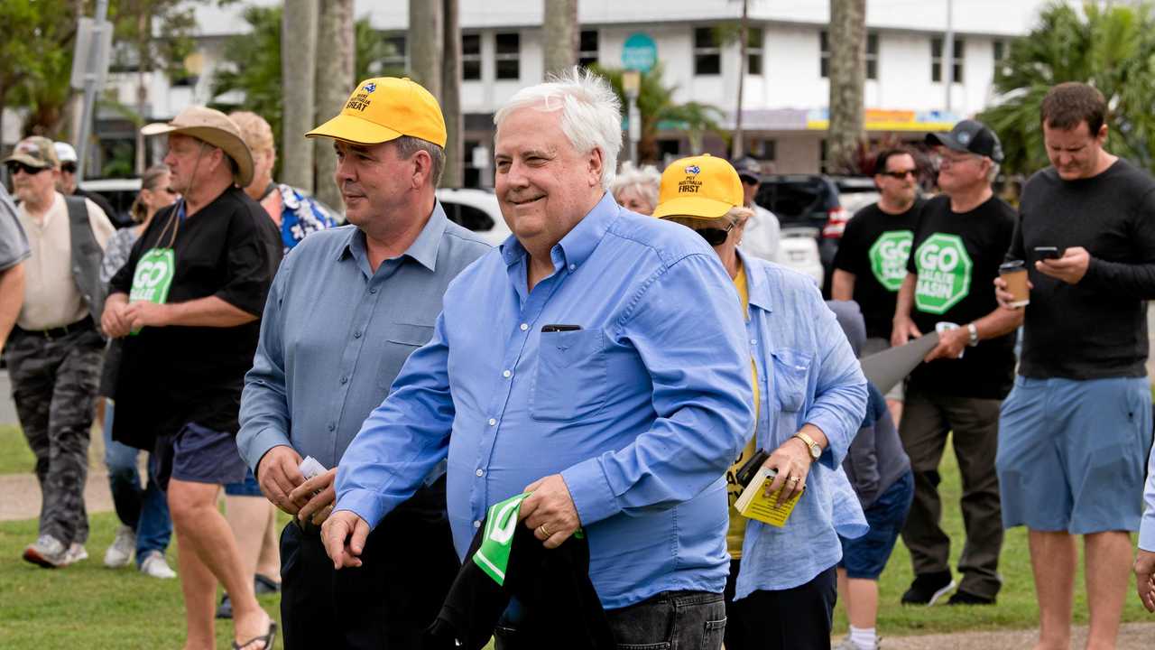 Clive Palmer, flanked by Dawson candidate Colin Thompson, at a rally in Mackay on Saturday to counter Bob Brown&#39;s anti-Adani convoy. Picture: Emma Murray