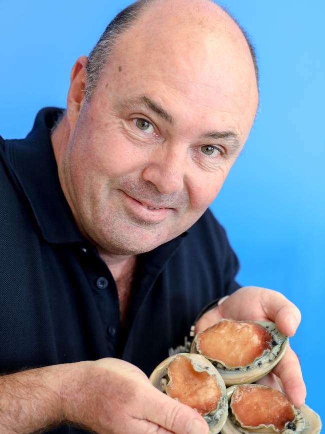 Yumbah Kangaroo Island general manager David Connell with frozen Abalone. Picture: AAP/Russell Millard