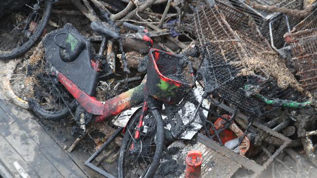 Hundreds of e-bikes have ended up in the bottom of the Yarra since the bike share service was introduced. Picture: David Crosling