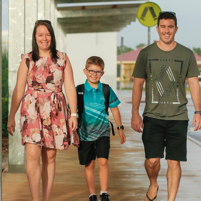 Tennille and Chris Sanderson with their son Thomas on the first day of school at Zuccoli Primary. Picture: GLENN CAMPBELL
