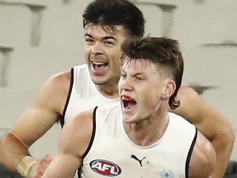 MELBOURNE, AUSTRALIA - JULY 03: Sam Walsh of the Blues celebrates a goal during the round 16 AFL match between Fremantle Dockers and Carlton Blues at the Melbourne Cricket Ground on July 03, 2021 in Melbourne, Australia. (Photo by Darrian Traynor/Getty Images)