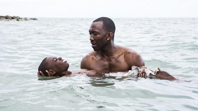 Ali, as Juan, teaches Chiron (played by Alex Hibbert) to swim in one of Moonlight’s most moving scenes. Picture: Roadshow