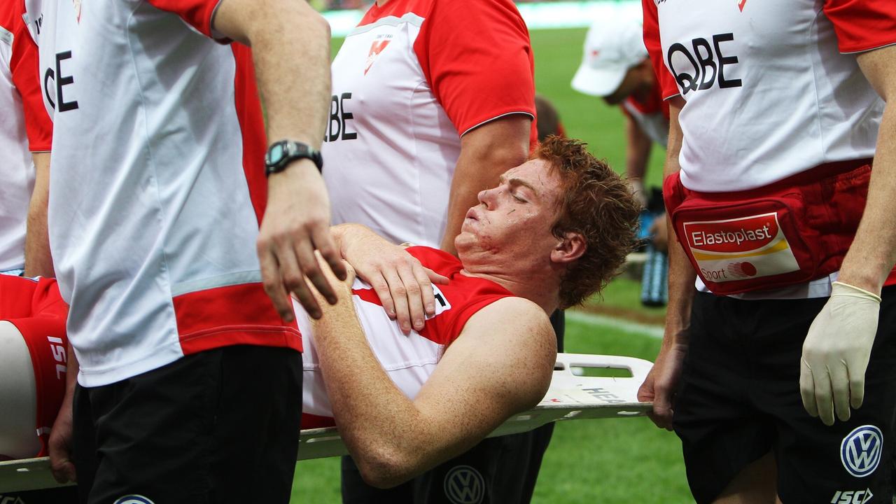 Gary Rohan is stretchered off after the incident with Lindsay Thomas in 2012.