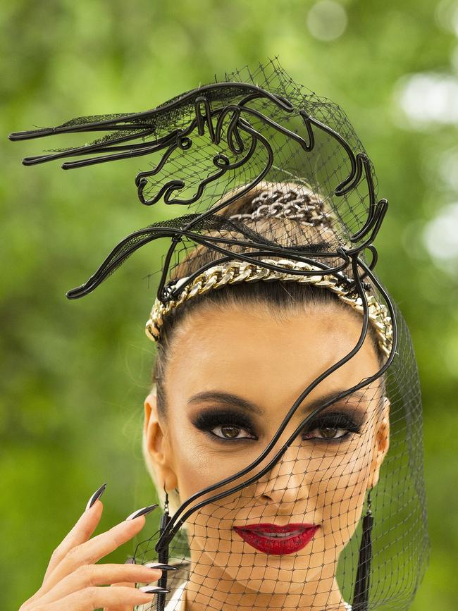 A racegoer shows off a horse fascinator. Picture: Jenny Evans/Getty Images