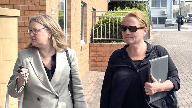 Hillcrest jumping castle operator Rosemary Gamble (R) walking into Devonport magistrates Court. Picture: Matthew Denholm