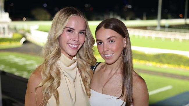 Jasmin Nagy and Violet Soulsby at Magic Millions Twilight Racing at Gold Coast Turf Club for Gold Coast at Large. Picture, Portia Large.