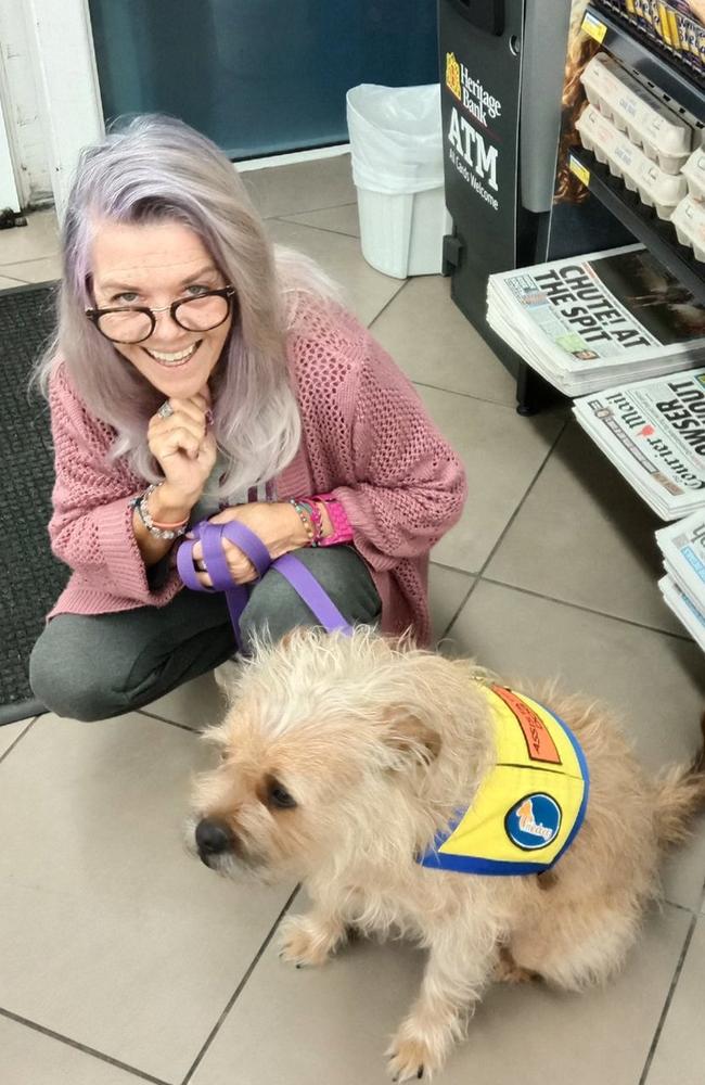 Cheryl Cogan of Varsity Lakes with her accredited mental health assistance dog, Poppy. Ms Cogan alleges she was denied access to a Gold Coast doctor's office because of her Poppy and has lodged formal complaints. Picture: Supplied