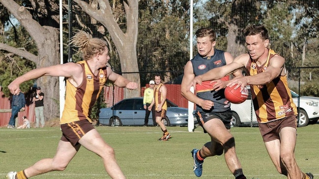 Matt Dominish (left) lays a shepherd for Langhorne Creek. Picture: Langhorne Creek Football Club