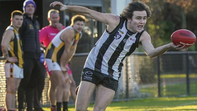 Action from the Narre Warren and UpweyTecoma match. Picture: Valeriu Campan