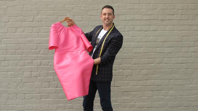 Brisbane designer Daniel Moore from Alter-Ego has created some of the Queensland Premier's dresses for the Commonwealth Games. Picture: Mark Cranitch.