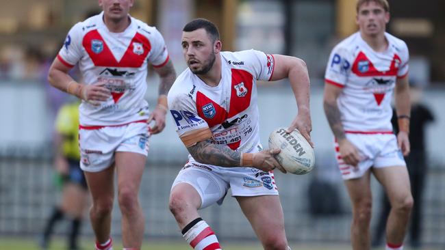 Luke Moore suffered a serious pectoral injury early in the game. Picture: Sue Graham