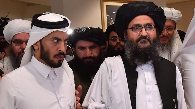 Taliban leader Mullah Abdul Ghani Baradar, right. Picture: AFP