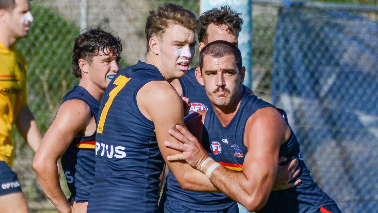 Riley Thilthorpe (left) and Taylor Walker at Crows training. Picture: Brenton Edwards