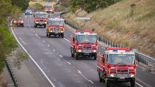 CFA fire crews travel up the Hume Highway to assist in the NSW bushfires. Picture: Tom Winter