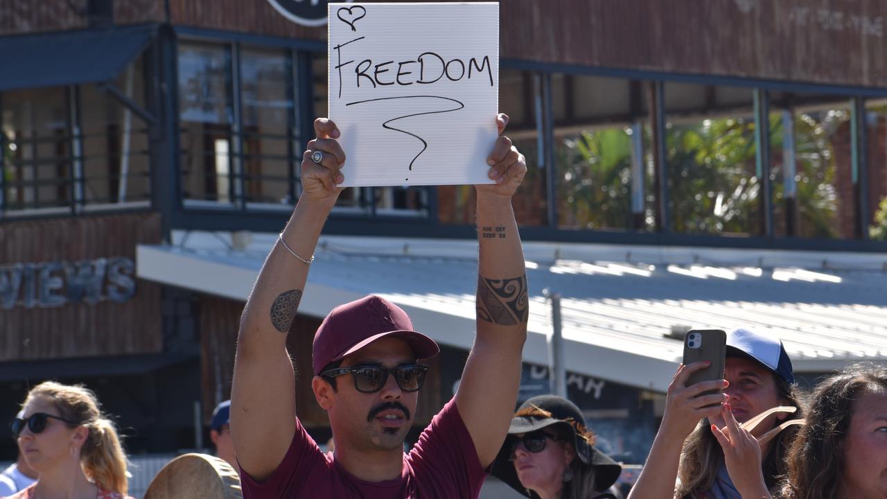 Sign held at Point Danger. Photo: Liana Walker