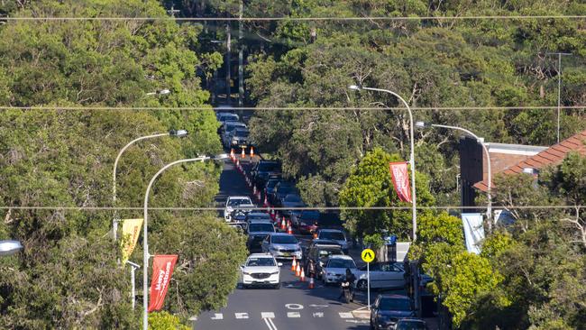 Cars are seen lining up at a COVID-19 pop-up testing drive-through station in Avalon on December 18, 2020 in Sydney, Australia. Picture: Jenny Evans/Getty Images