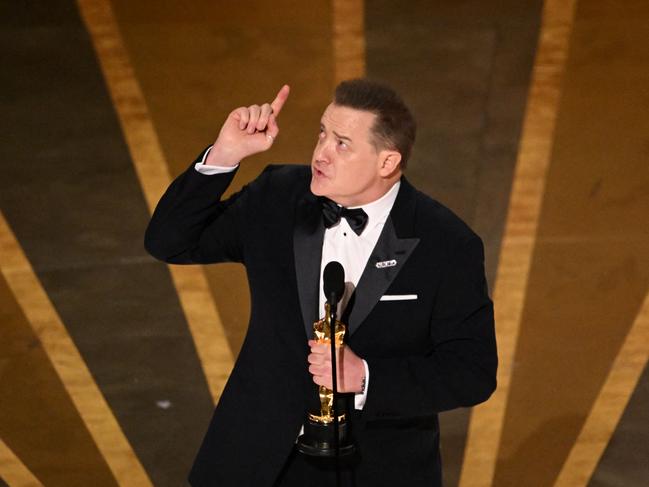 US actor Brendan Fraser accepts the Oscar for Best Actor in a Leading Role for "The Whale" onstage during the 95th Annual Academy Awards at the Dolby Theatre in Hollywood, California on March 12, 2023. (Photo by Patrick T. Fallon / AFP)