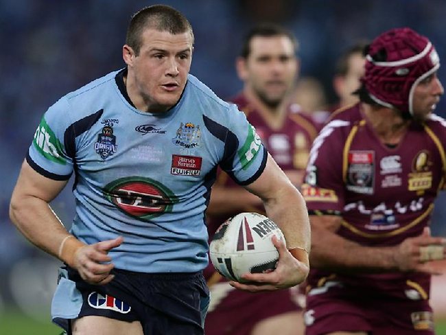 <p>State of Origin II, 2012: NSW centre Josh Morris steams towards the tryline in the 48th minute. Picture: Gregg Porteous</p>