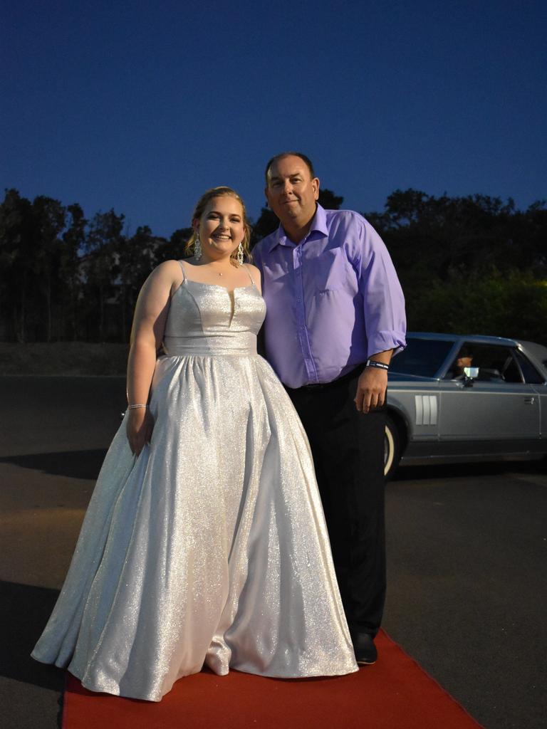 RIVERSIDE FORMAL: Taylah Harris walks down the red carpet at the Riverside Christian College Formal. Photo: Stuart Fast