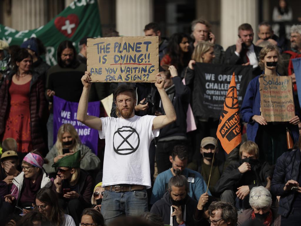 Extinction Rebellion protesters call for action on climate change during a rally in Trafalgar Square, London, this month. Picture: AP Photo/Matt Dunham