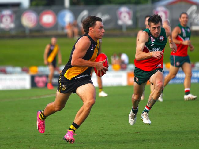 Pictured: Tiger Billy Welch and Cutter Liam McCarthy. South Cairns Cutters v North Cairns Tigers at Cazalys Stadium. Qualifying Final. AFL Cairns 2024. Photo: Gyan-Reece Rocha