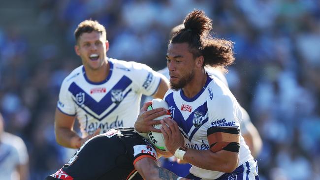 SYDNEY, AUSTRALIA - MARCH 19: Raymond Faitala-Mariner of the Bulldogs is tackled during the round three NRL match between Canterbury Bulldogs and Wests Tigers at Belmore Sports Ground on March 19, 2023 in Sydney, Australia. (Photo by Mark Metcalfe/Getty Images)