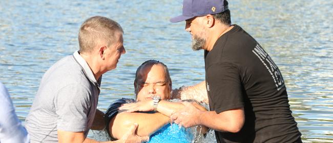 Tom Tate was baptised at Evandale Lake during a combined churches service this year. .Picture Mike Batterham