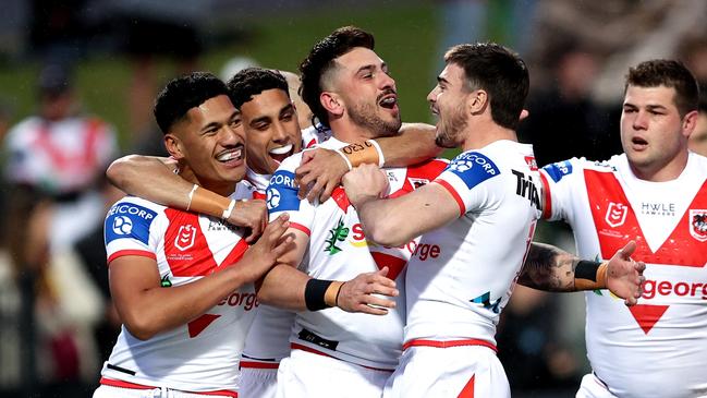 SYDNEY, AUSTRALIA - SEPTEMBER 03: Jack Bird of the Dragons celebrates scoring a try with team mates during the round 25 NRL match between the St George Illawarra Dragons and the Brisbane Broncos at Netstrata Jubilee Stadium, on September 03, 2022, in Sydney, Australia. (Photo by Brendon Thorne/Getty Images)