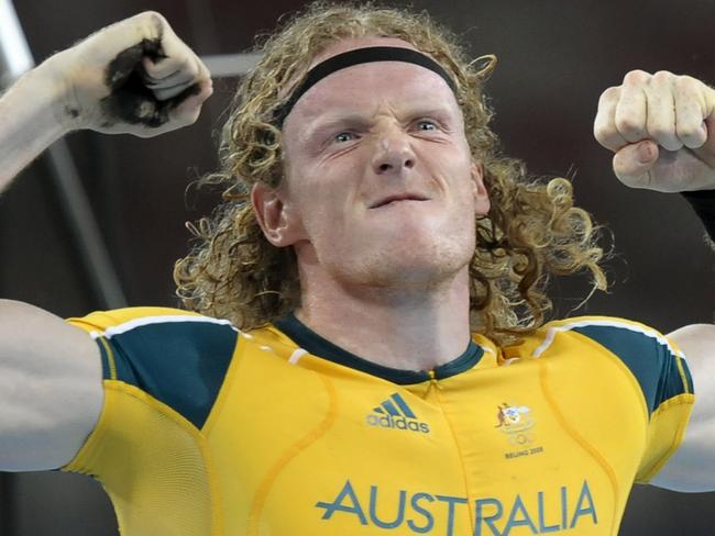 Australia's Steve Hooker celebrates after winning the men's pole vault final at the 'Bird's Nest' National Stadium during the 2008 Beijing Olympic Games on August 22, 2008. Hooker set an Olympic record of 5.96m to win the men's pole vault gold medal. AFP PHOTO/DDP/MICHAEL KAPPELER