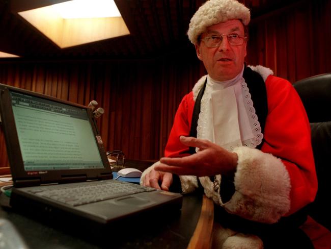 Justice Peter Underwood with his laptop in the Hobart Supreme Court in 1999.