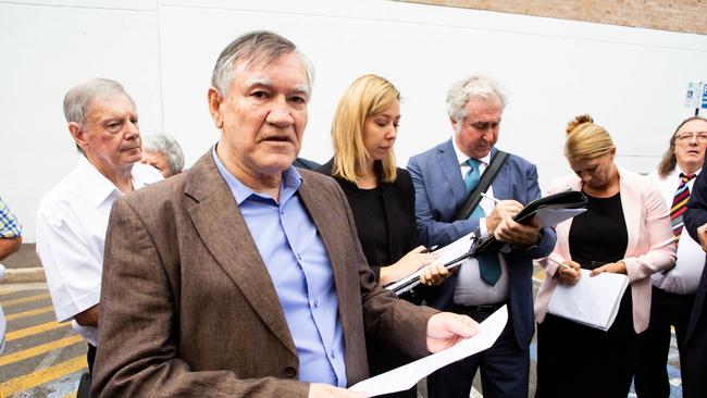 Robert Fox speaks to lawyers representing the council outside The Roxy Theatre in Parramatta. Picture: Jordan Shields