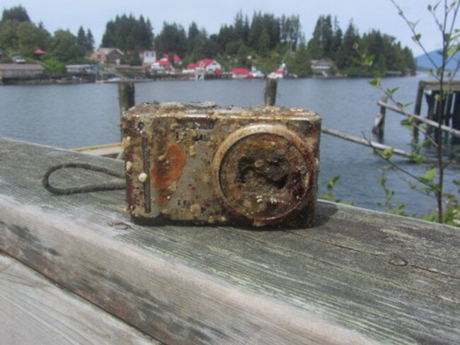 Lucky find: Divers were able to return this camera and a memory stick full of photos to its owner. Photo: Supplied.
