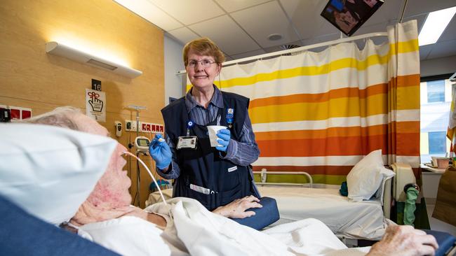 DoSomething Day 2018.Pictures taken on 25th July 2018 at Royal North Shore Hospital of volunteer feeder Chris Oberle from Wollstonecraft feeding a patient their lunch. (AAP Image / Julian Andrews).