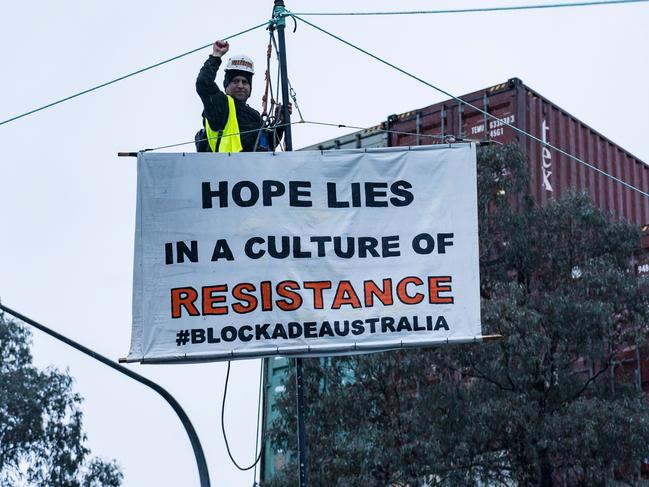 Blockade Australia climate activist Brad Homewood climbed to a monopole on Monday.