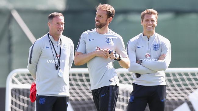 Brains trust … England head coach Gareth Southgate (centre) with his assistants Steve Holland (left) and Allan Russell. Photo: Getty Images