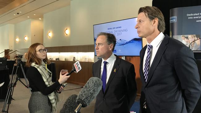 Health Minister Greg Hunt and CEO, The Royal Life Saving Society Australia Justin Scarr. Picture: AAP / Patrick Griffiths