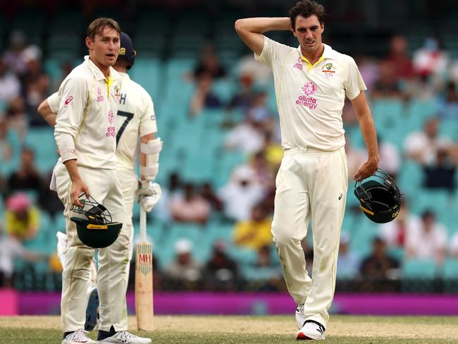 SYDNEY, AUSTRALIA - JANUARY 09: Pat Cummins of Australia looks on as bad light sets in during day five of the Fourth Test Match in the Ashes series between Australia and England at Sydney Cricket Ground on January 09, 2022 in Sydney, Australia. (Photo by Cameron Spencer/Getty Images)