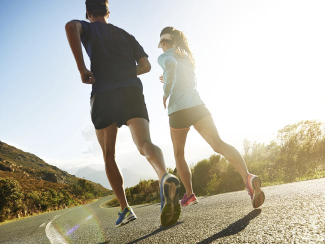 Rearview shot of two people running on a country roadFeeling Great 3/8 - exercise shoes