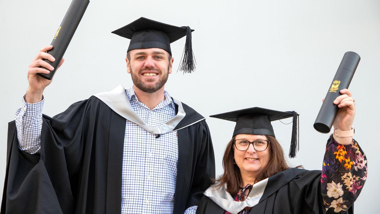 Graduating with a Master in Business Administration, Chris Hayes and Carmel Brown. UniSQ graduation ceremony at Empire Theatre. Wednesday, June 28, 2023