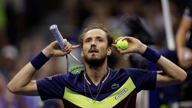 Daniil Medvedev, interacting with the crowd at last year’s US Open, has vowed to improve his on-court displays. (Photo by kena betancur / AFP)