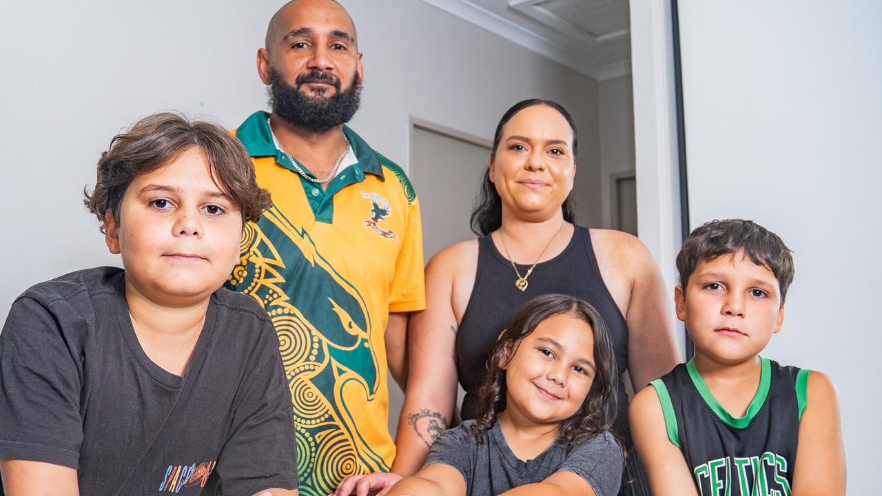 Darwin parents Sarah and Murray Liddle with their children Bradley, 12, Orlando, 9, and six-year-old Brooklyn getting the keys to their new home through the Yilli Rreung Housing Aboriginal Corporation.