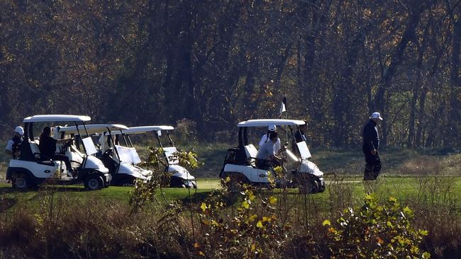 US President Donald Trump walks the golf course at Trump National Golf Club on November 7 in Sterling, Virginia as Democrat Joe Biden was declared the election winner. Picture: AFP