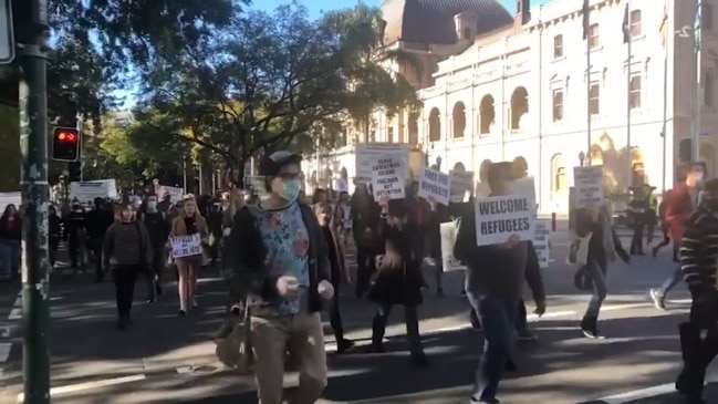 Activists block streets in Brisbane to protest offshore detention