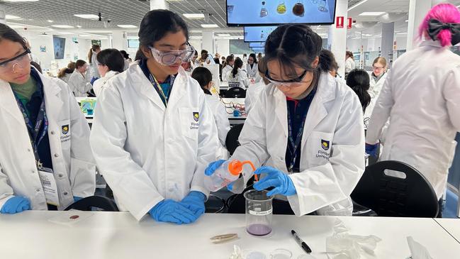 Darwin Middle School students Saibreena Khan, Grishma Desai and Renee Li at the Flinders University STEM academy.