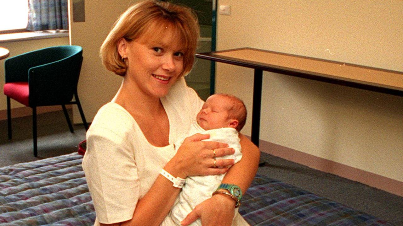Kim Walters holding baby Billy in 1994. She died after a battle with breast cancer in 1998.