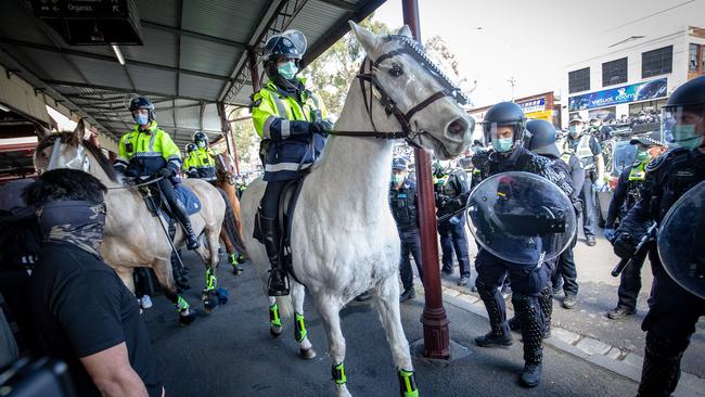 Heavily armed police and the mounted branch at the market. Picture: Darrian Traynor/Getty Images